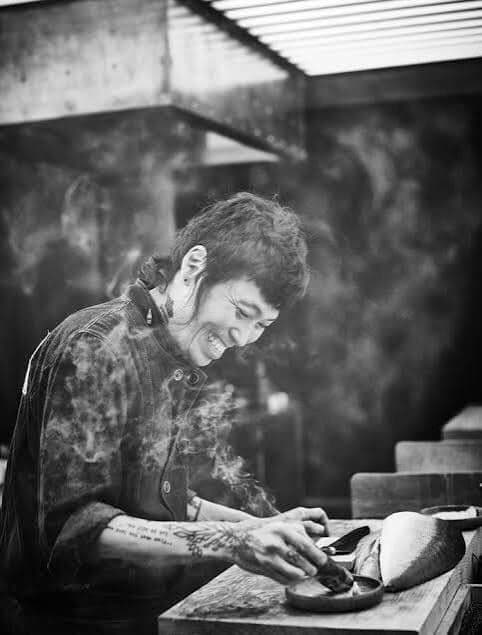Chef Yoshi Okai plating at the omakase counter